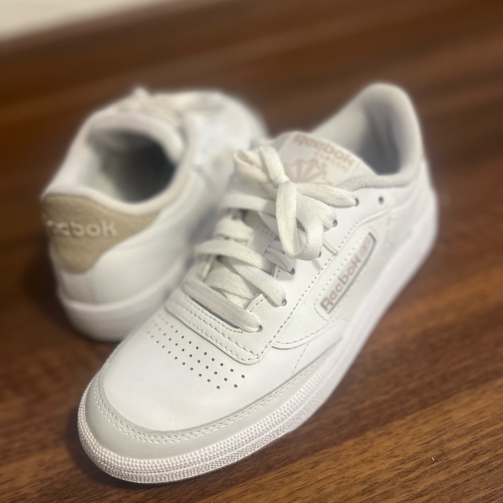 Reebok Women’s classic white/gold accent retro sneakers